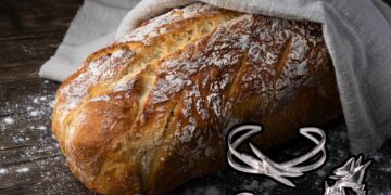 Români arestați în Elveția: Bijuterii furate ascunse într-o pâine, descoperite de polițiști